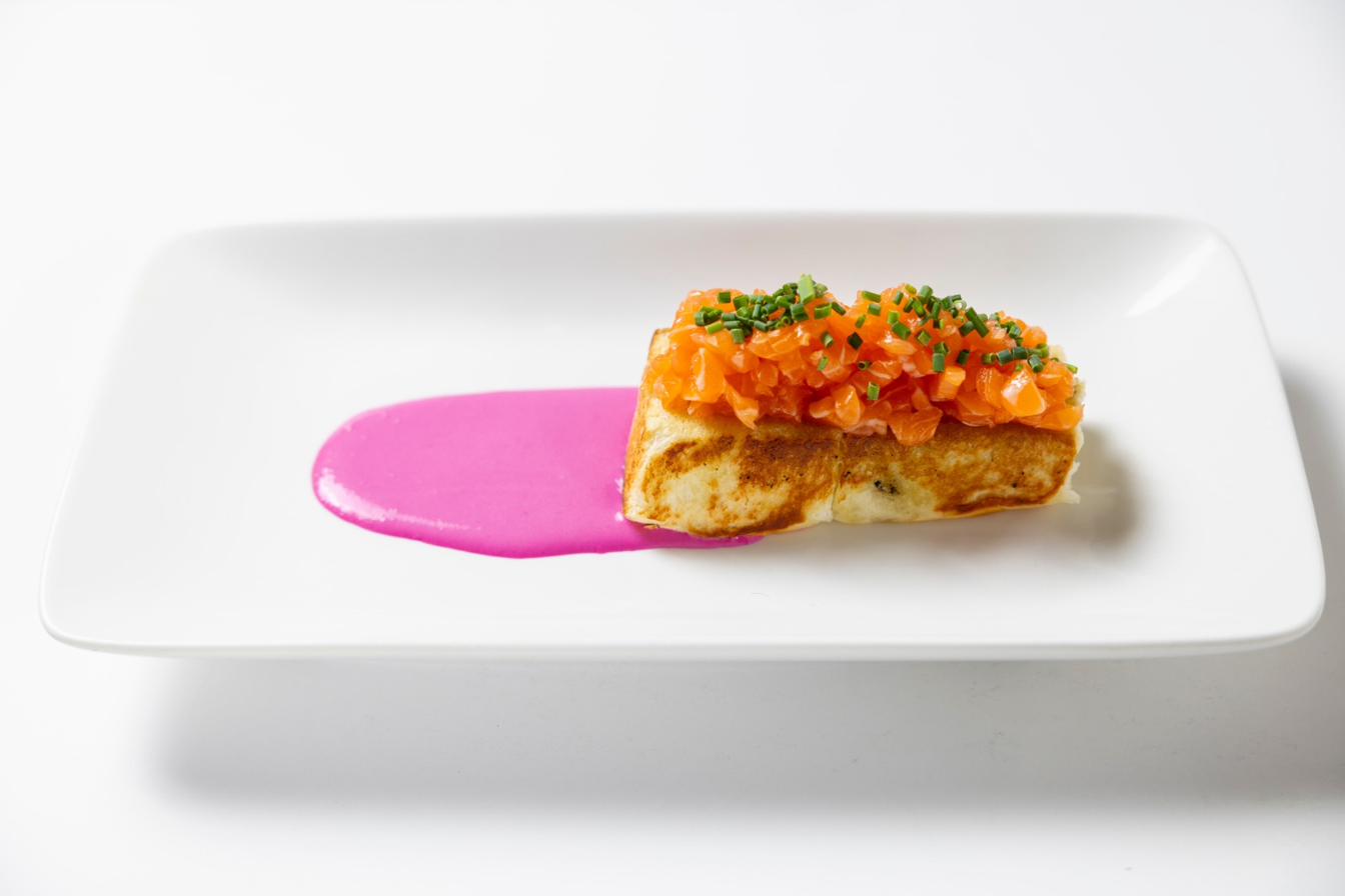 Salmon tartare on toast with beet aioli